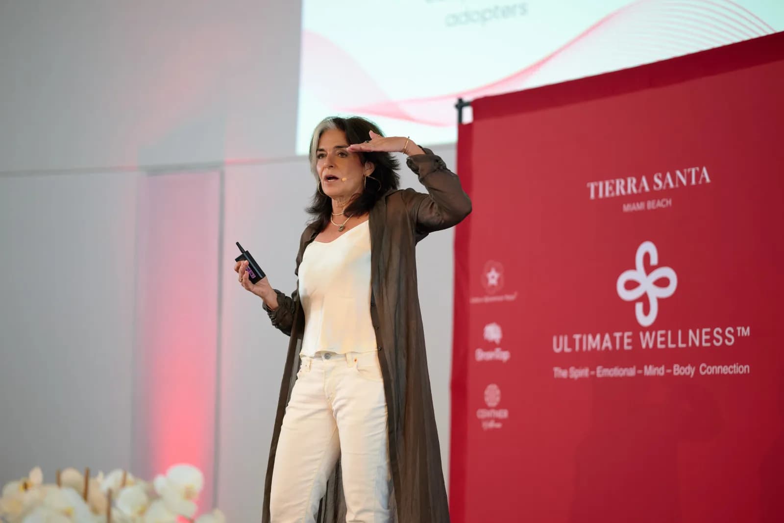 Nathalie Niddam speaking at the Ultimate Wellness conference